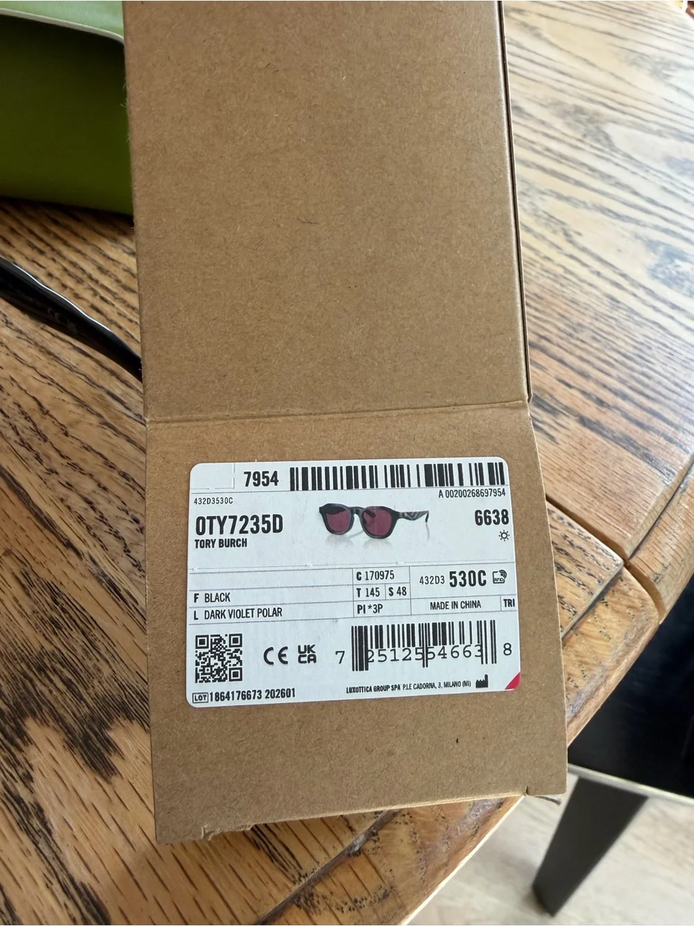 Tory Burch Black Frame Sunglasses with Violet Polarized Lenses